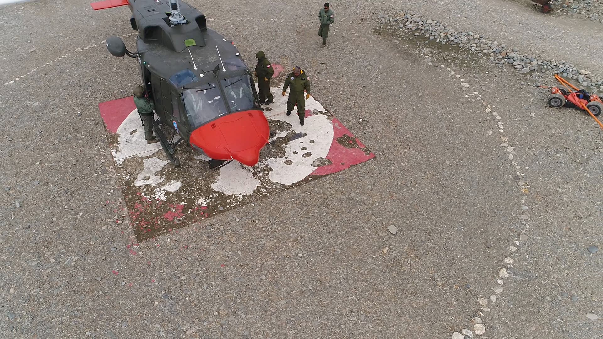 Helicopter on the landing pad at the base